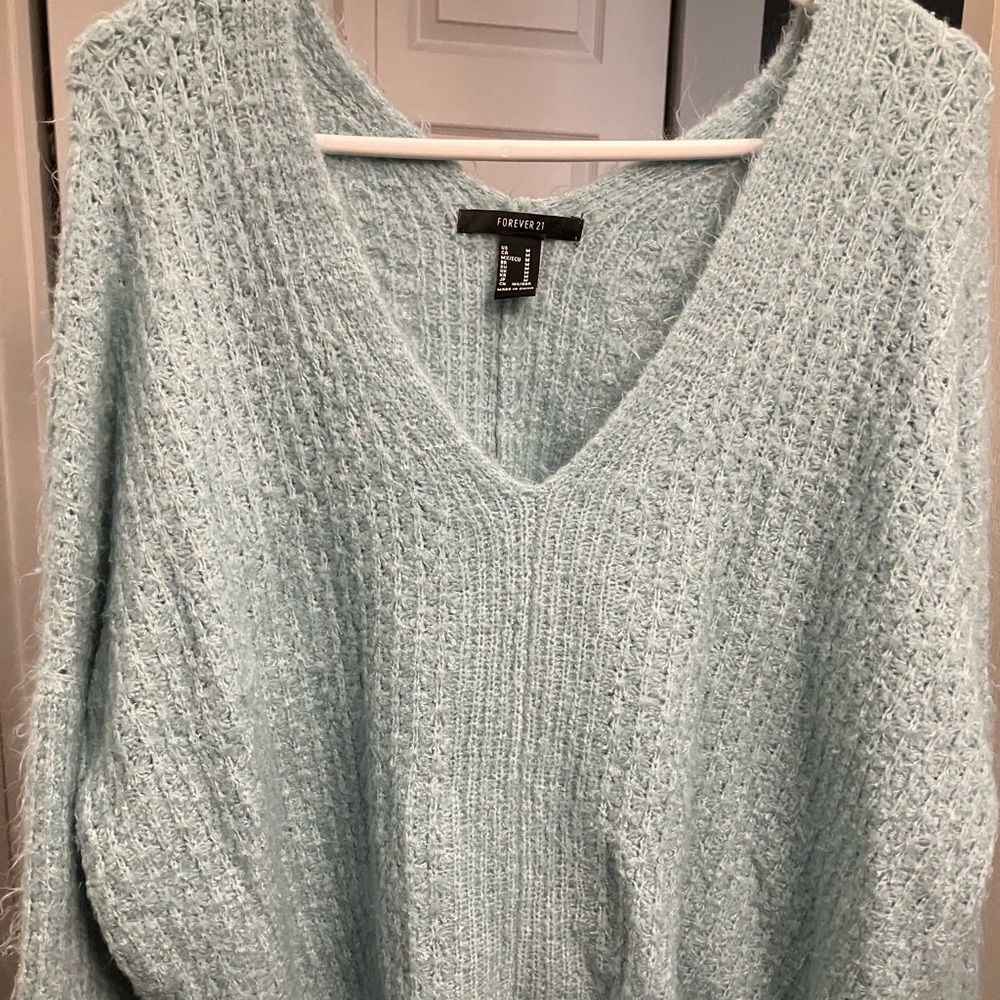 Fuzzy light blue sweater